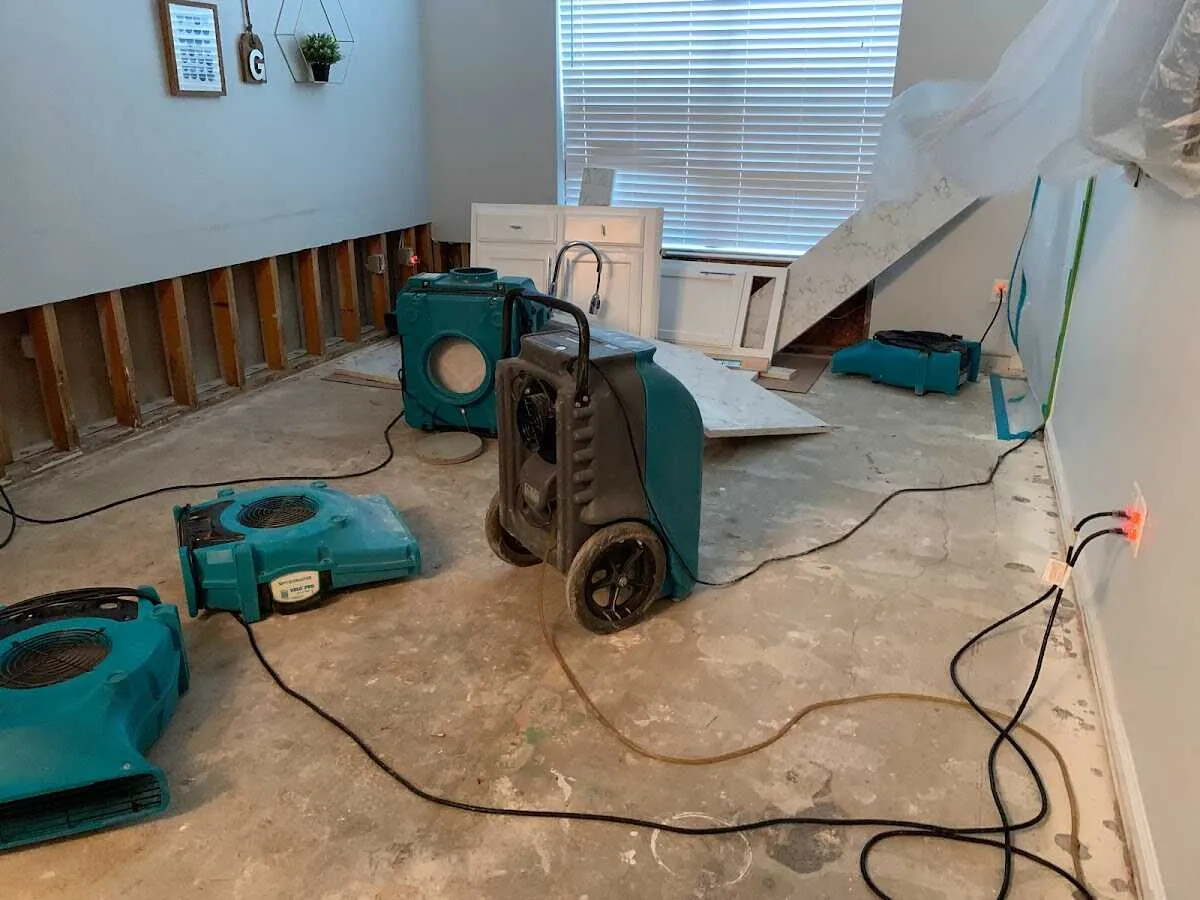 Dehumidifier in flood-cut room for Water Damage Restoration in Mendon